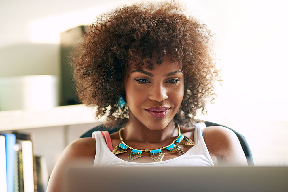 woman watching an online class